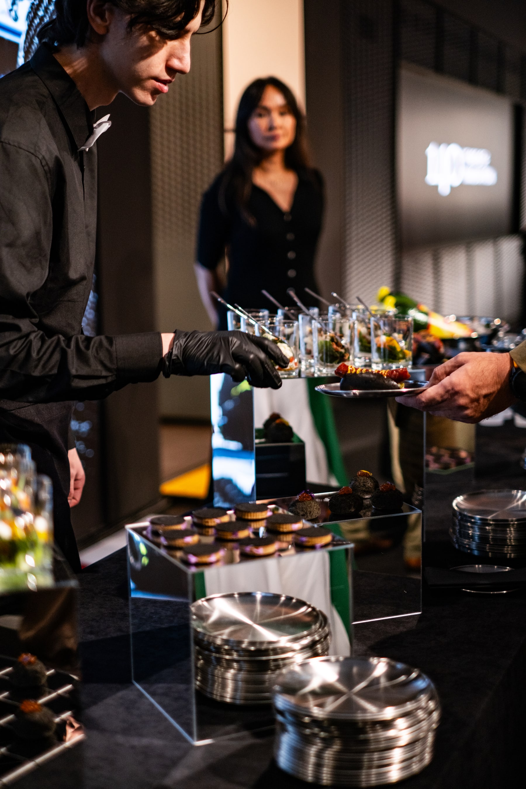 Good Catering service team serving petit bites to guests